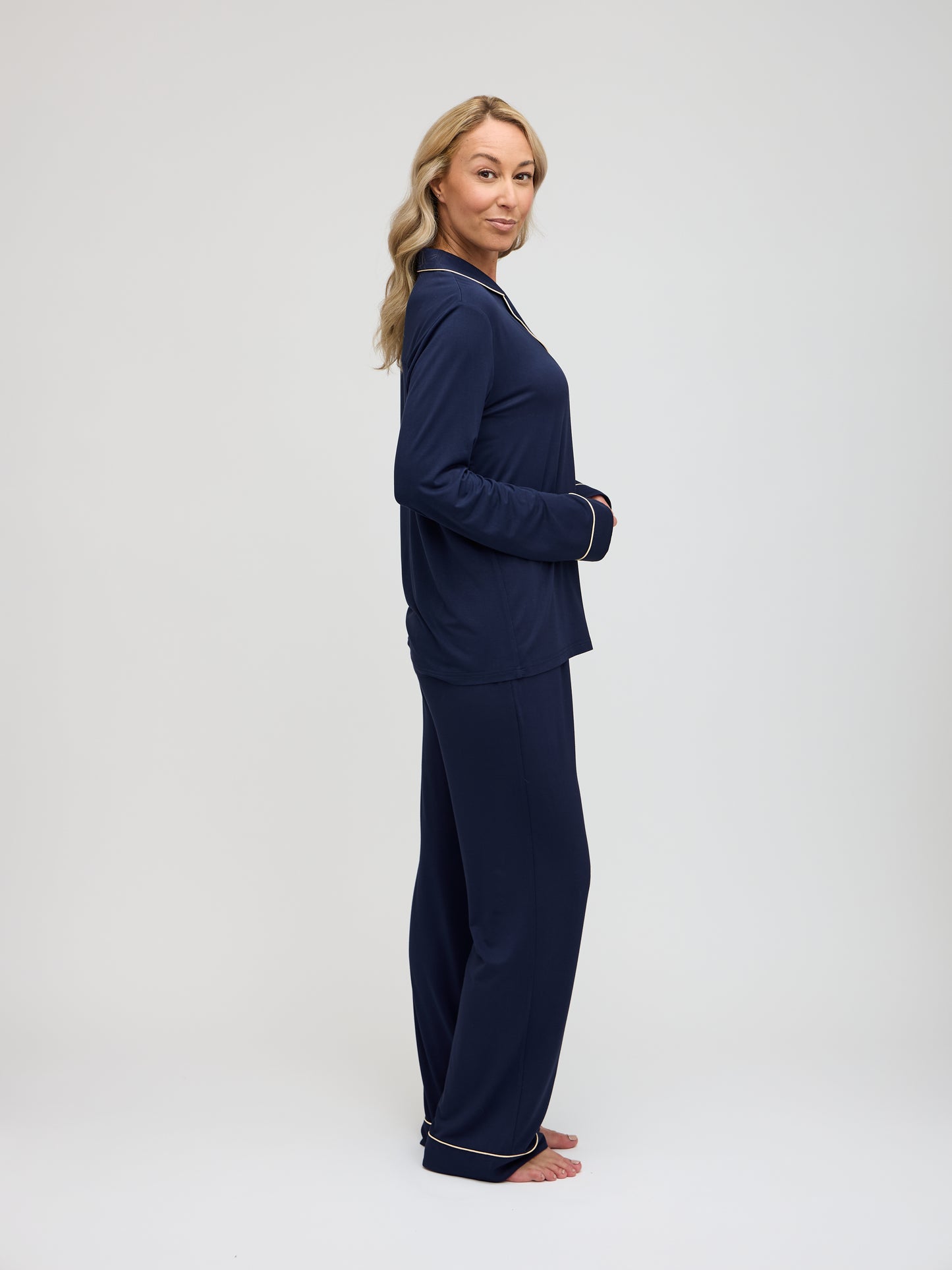 Side view of navy pajama set showing relaxed fit