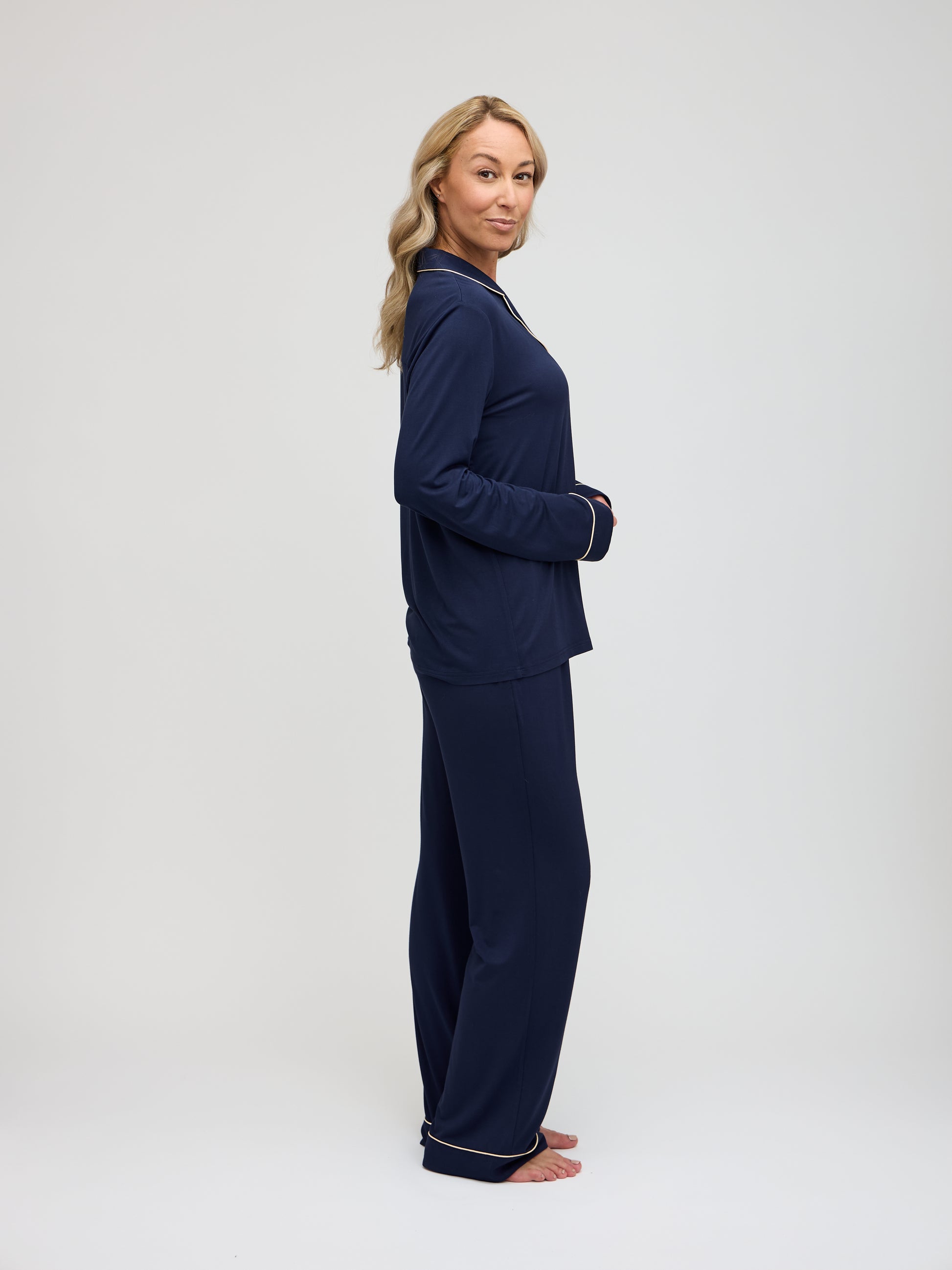 Side view of navy pajama set showing relaxed fit